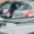 A guy checking out the wide variety of used cars for sale at R&B Car Company Fort Wayne dealership lot.