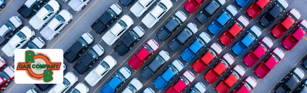 R&B Car Company Fort Wayne dealership showcasing a lineup of used pickup trucks for sale.