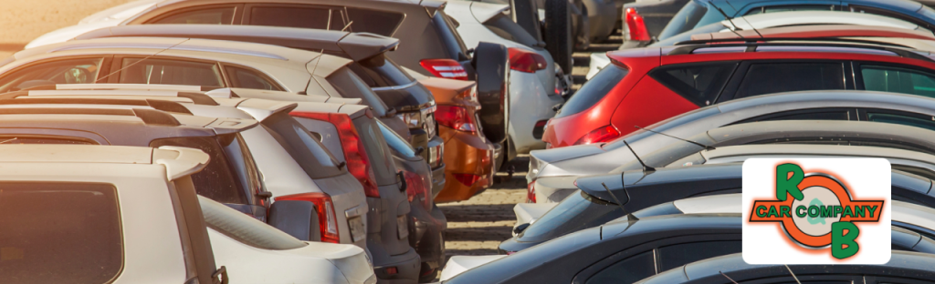 Exterior view of R&B Car Company Fort Wayne dealership with a variety of vehicles on display
