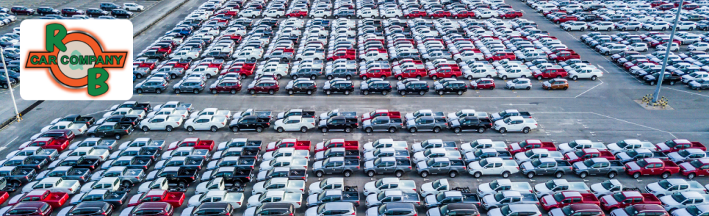 Used pickup trucks lined up at the R&B Car Company Fort Wayne dealership